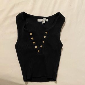 Black crop top with gold button snaps